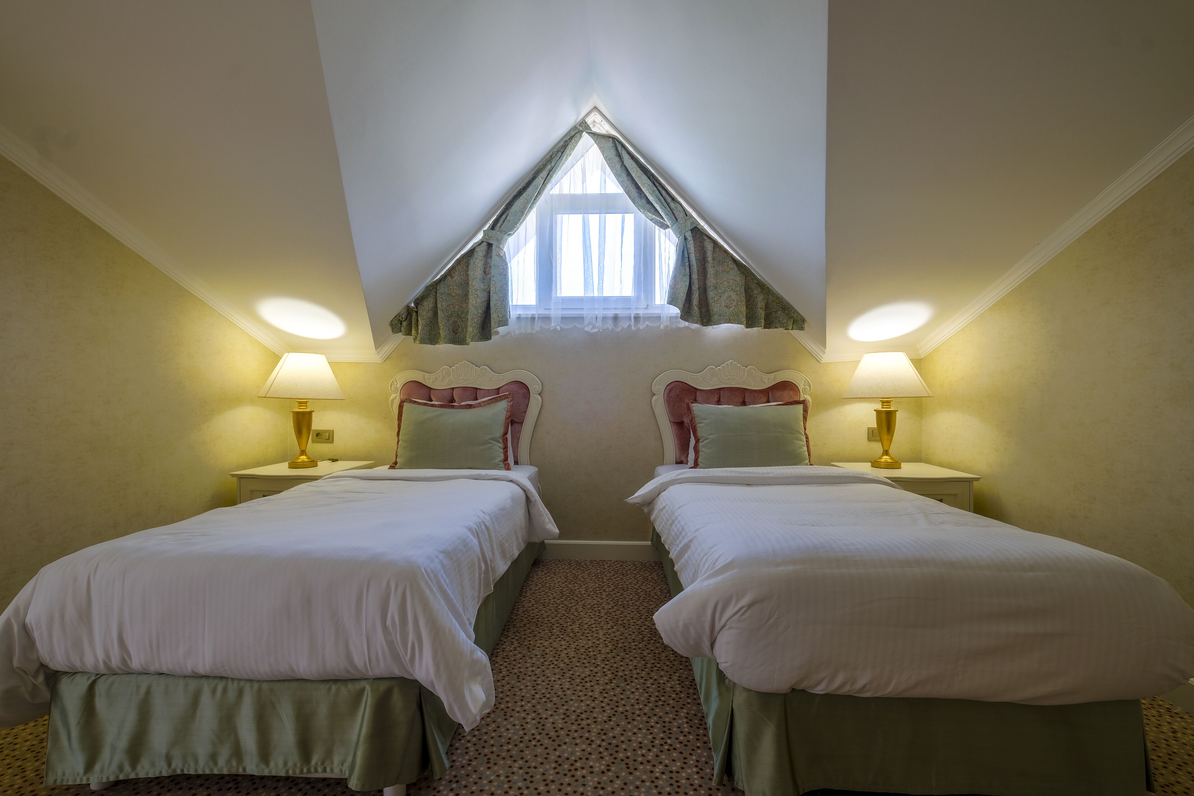 family room | 1 bedroom, minibar, in-room safe, desk