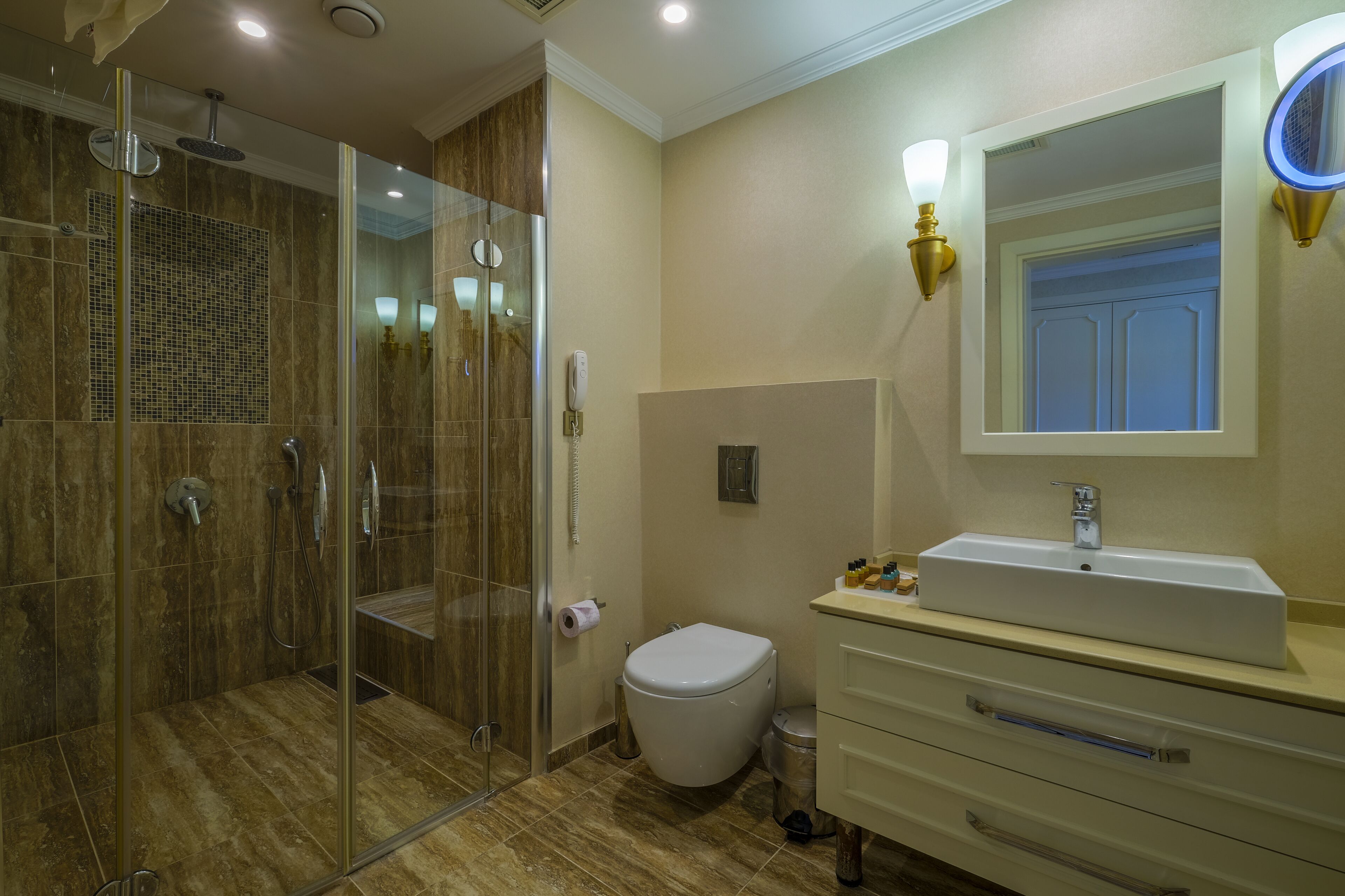 family room | bathroom | shower, rainfall showerhead, free toiletries, hair dryer