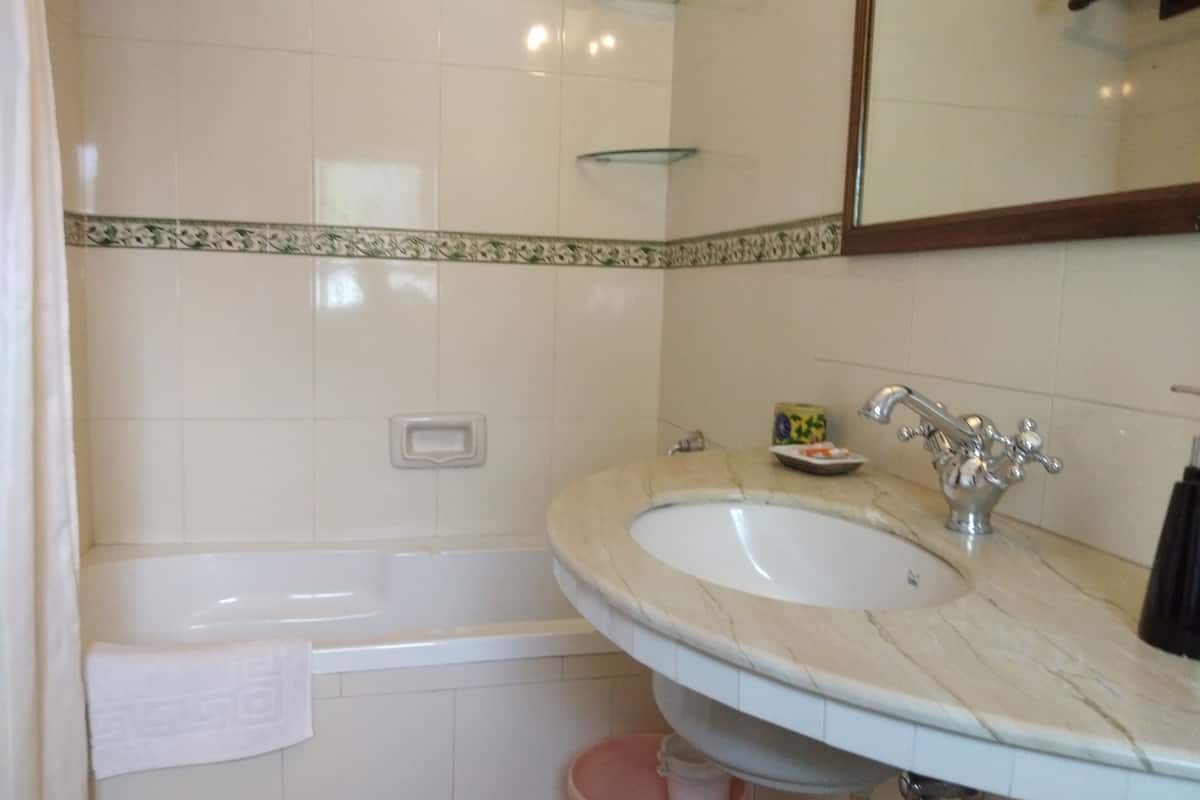 standard double room (with ac) | bathroom | deep-soaking bathtub, free toiletries, hair dryer, towels