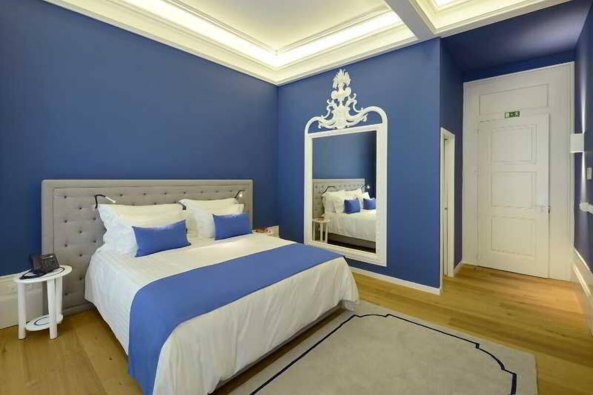 Luxe beddengoed, een minibar, een kluis op de kamer, een bureau