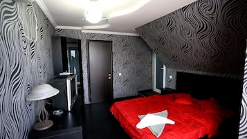 Frette Italian sheets, down duvets, pillow-top beds, desk