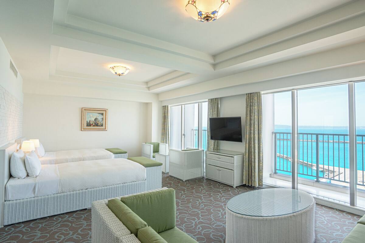 junior suite room non-smoking, ocean view | 1 bedroom, desk, blackout curtains, iron/ironing board