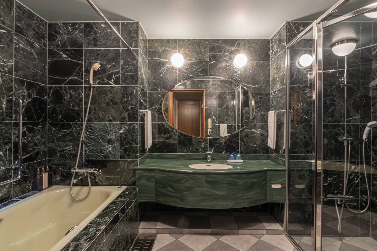 suite, non smoking, ocean view | bathroom | shower, hair dryer, slippers, electronic bidet