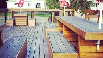 Seasonal outdoor pool, pool loungers