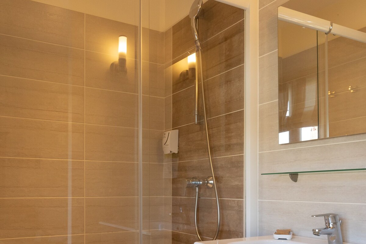Bathroom | Shower, free toiletries, hair dryer, towels
