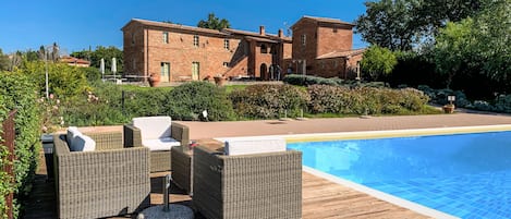 Seasonal outdoor pool, pool umbrellas, pool loungers