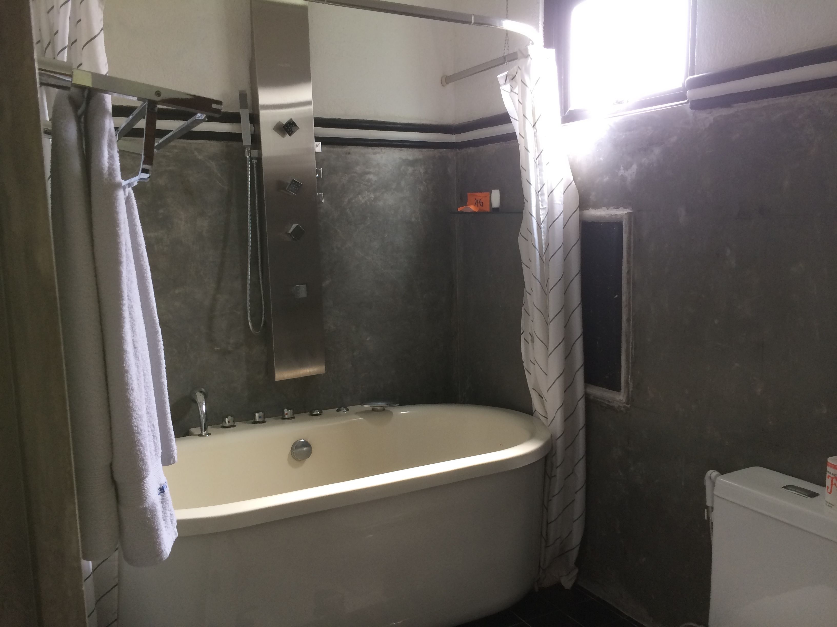 super deluxe room | bathroom | shower, free toiletries, hair dryer, towels