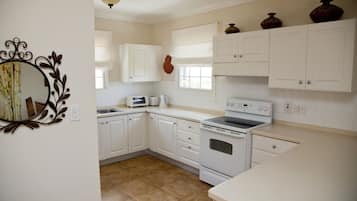 Villa, 3 Bedrooms, Partial Ocean View | Private kitchen | Microwave, oven, stovetop, cookware/dishes/utensils