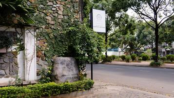 Stroll through the charming streets lined with lush greenery and historic architecture.