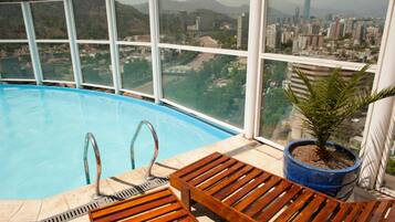Outdoor pool, a rooftop pool, sun loungers