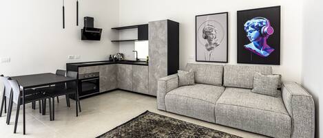 Exclusive Apartment | Living area | Flat-screen TV, Netflix