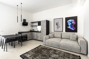 Exclusief appartement | Woonruimte | Een flatscreentelevisie en Netflix