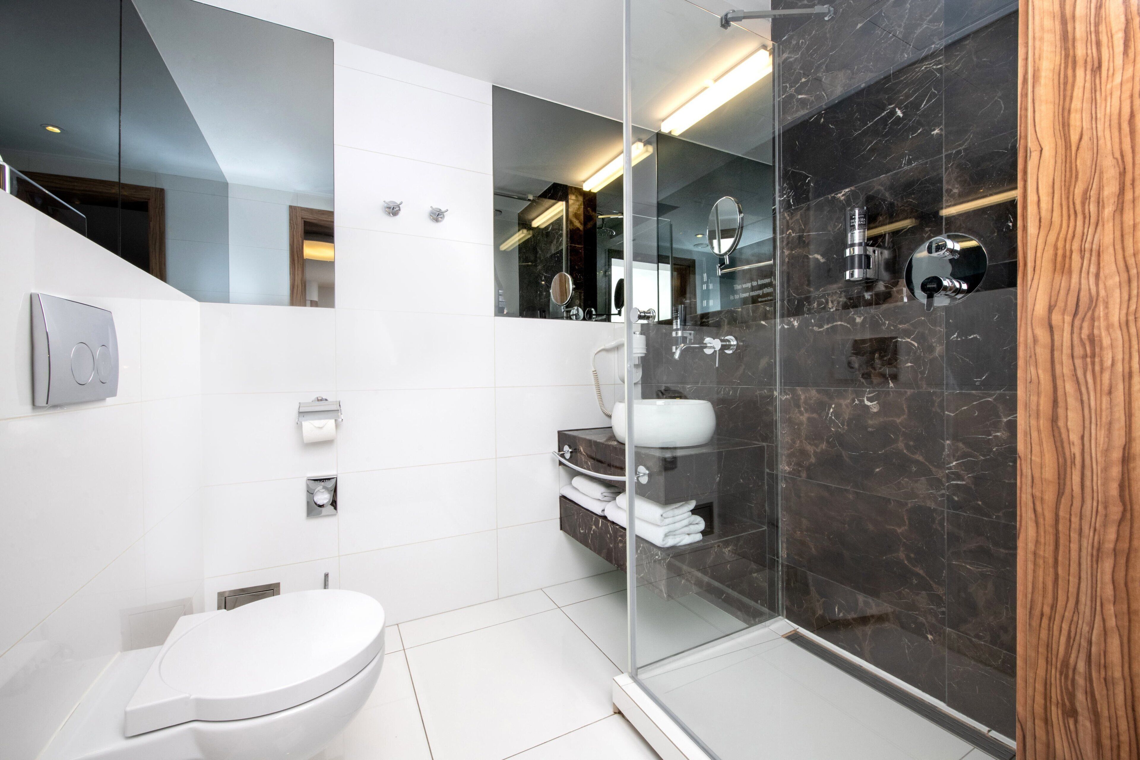 shower, eco-friendly toiletries, hair dryer, towels