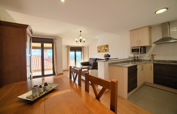 Comfort Apartment, 1 Bedroom | Living area | Flat-screen TV - Apartamentos Rurales Sierra de Gudar (Gudar)