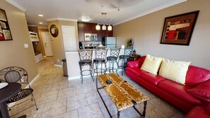 Condo, 2 Bedrooms, Sea View (Free activity tickets included) | Living area | 20-inch flat-screen TV with satellite channels, TV - Maravilla Seawall Condos by AB Sea (Galveston)