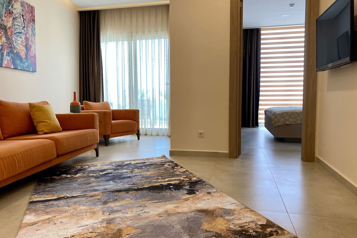 luxury suite | living room | 32-inch lcd tv with satellite channels, tv