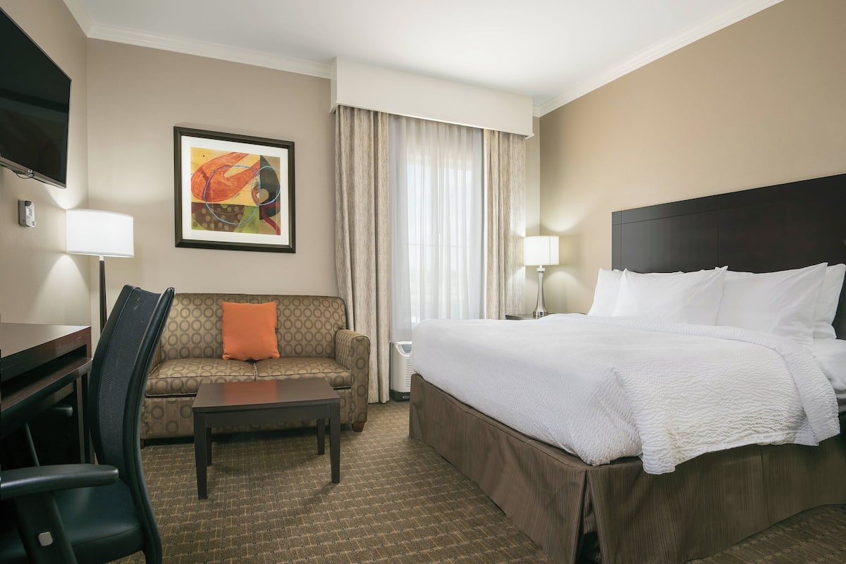 Studio Suite, 1 King Bed with Sofa bed, Non Smoking | Desk, laptop workspace, blackout curtains, iron/ironing board