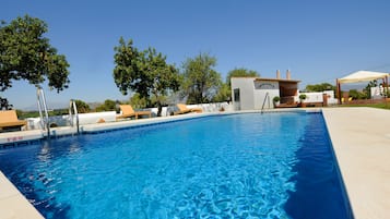 Outdoor pool, pool umbrellas, pool loungers