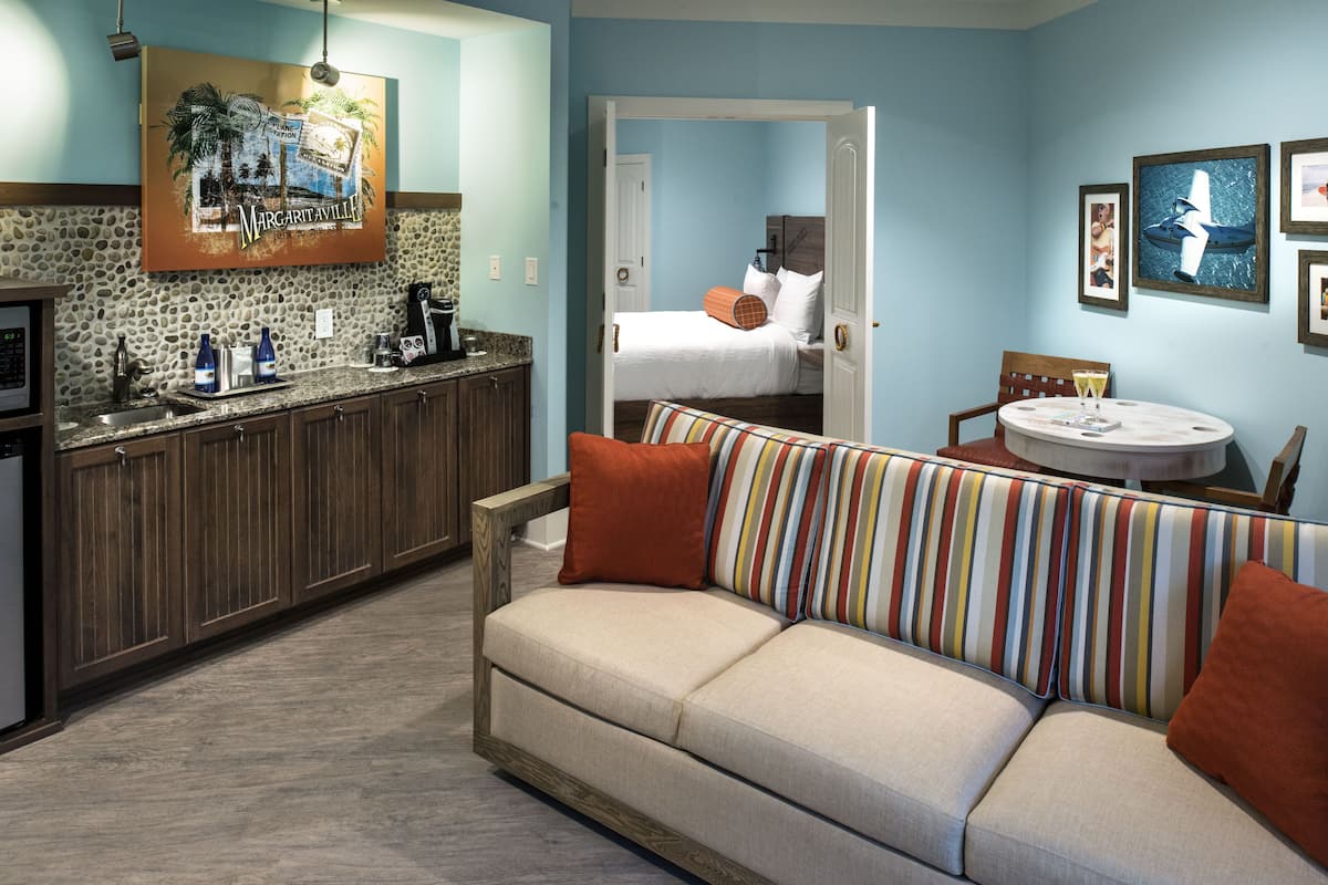 Suite, 1 King Bed with Sofa bed | Living room | 40-inch LCD TV with digital channels, TV, fireplace