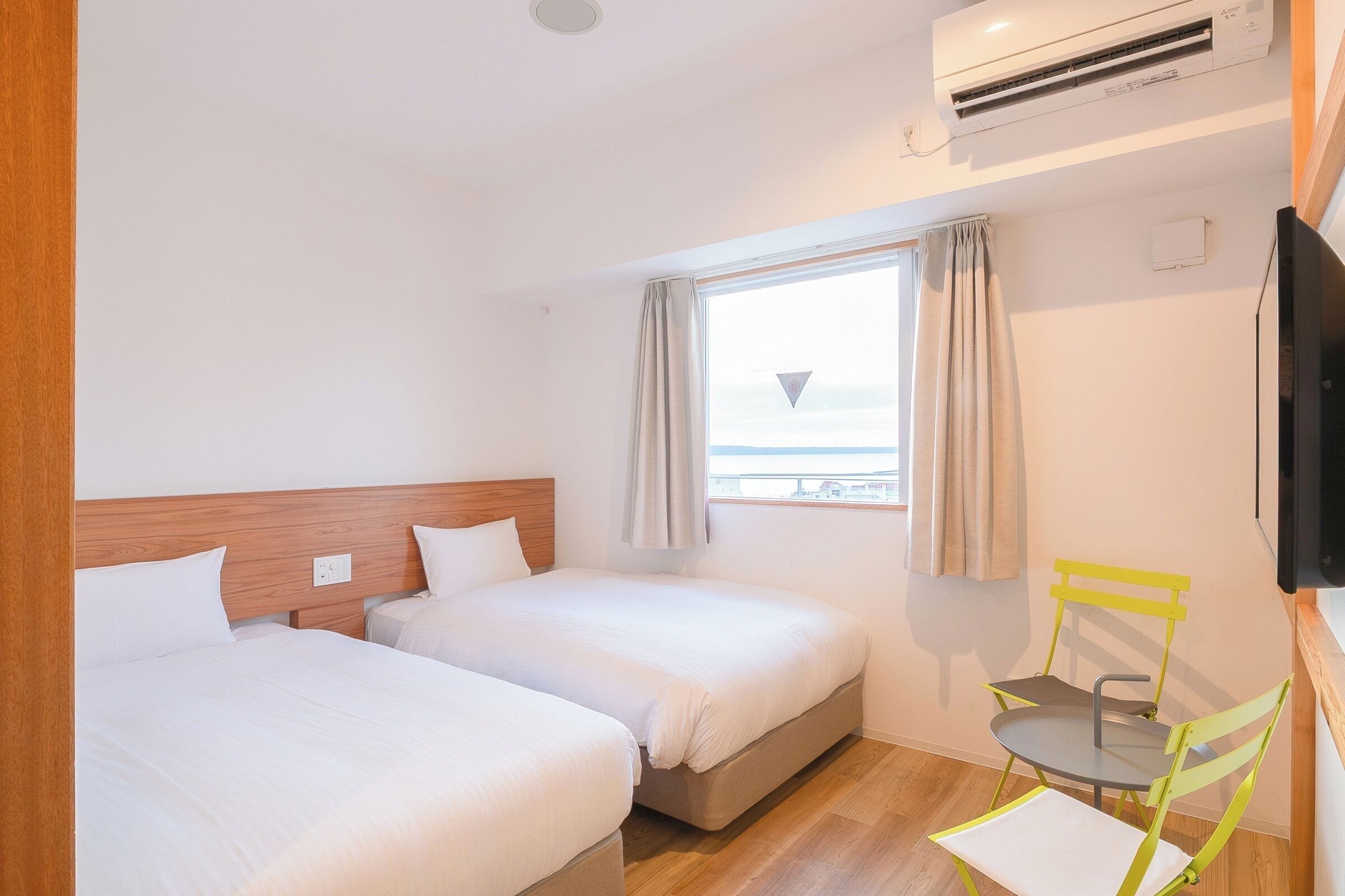 Twin room A, Non Smoking | Desk, laptop workspace, blackout drapes, iron/ironing board