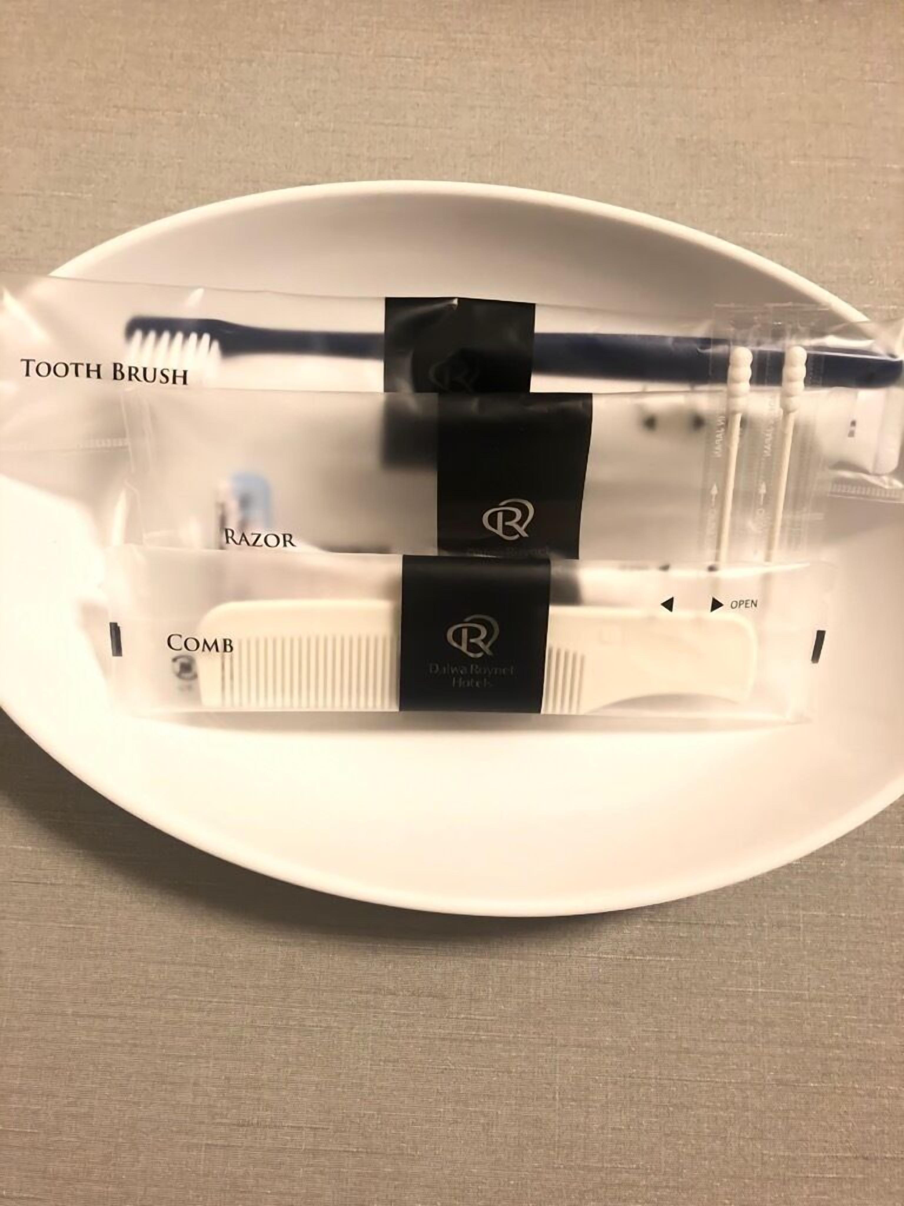 combined shower/bathtub, free toiletries, hair dryer, slippers