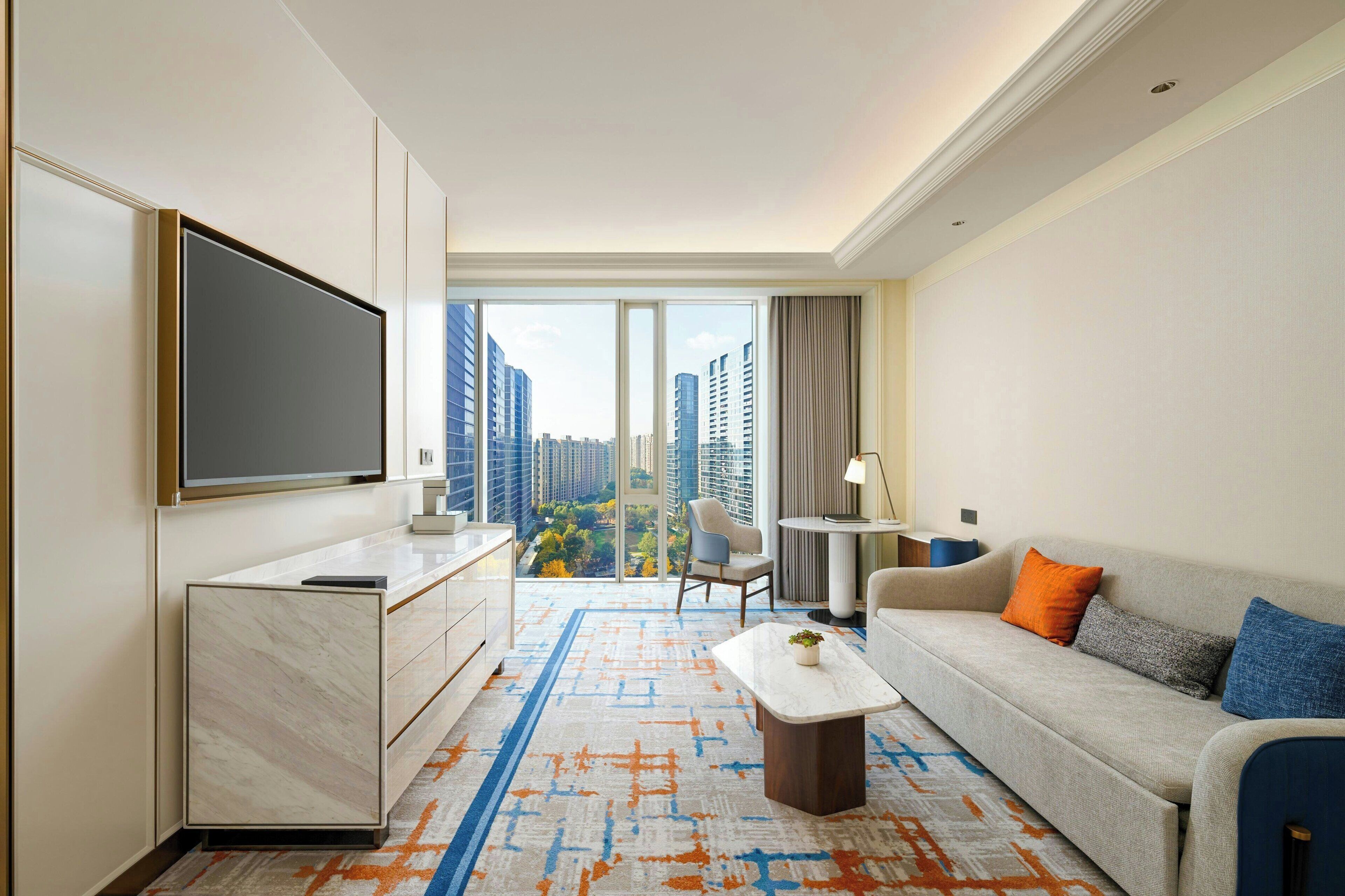 junior suite, 1 bedroom | living room | 46-inch led tv with satellite channels, tv, ipod dock