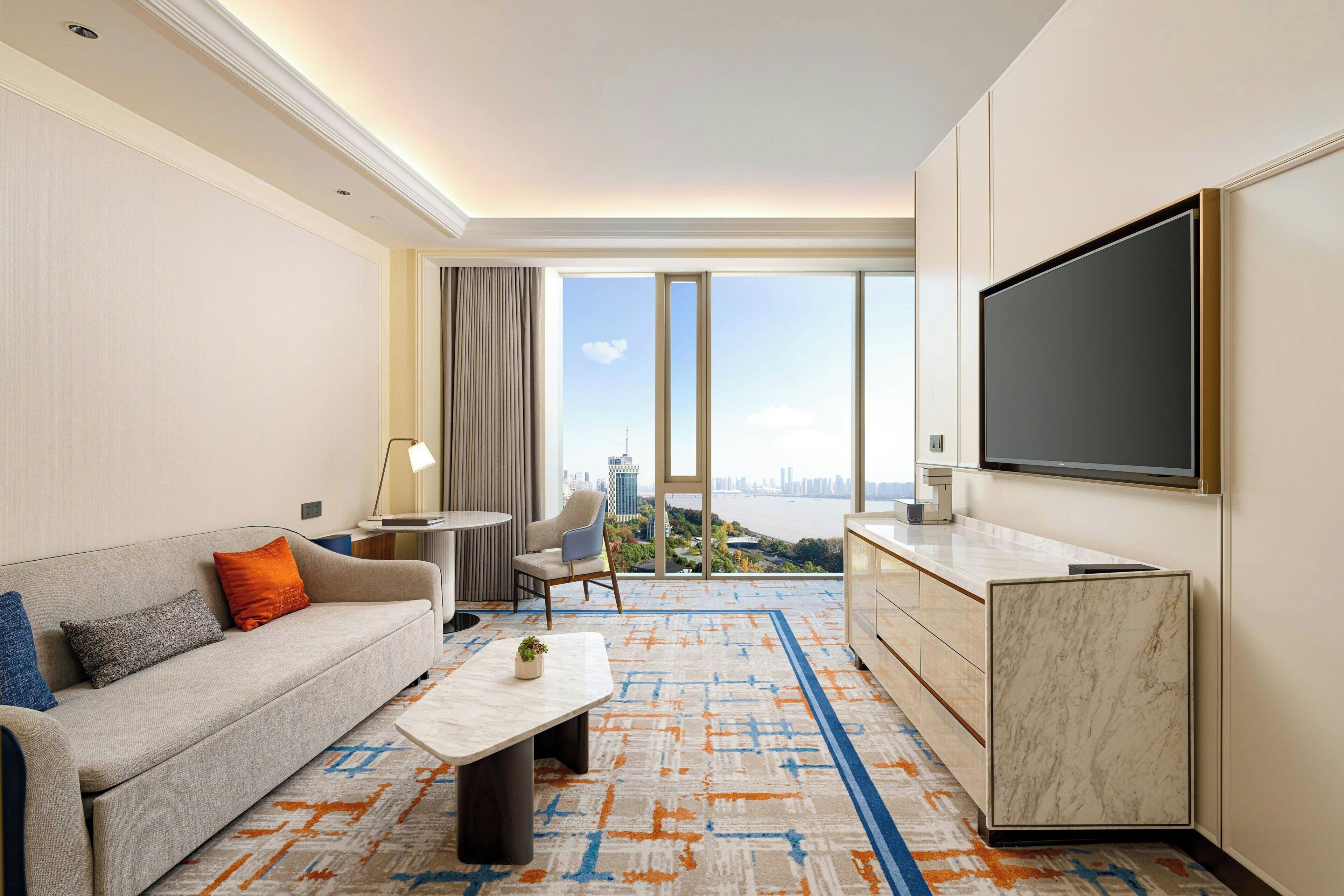 junior suite, 1 bedroom, river view | 1 bedroom, down duvets, in-room safe, individually decorated