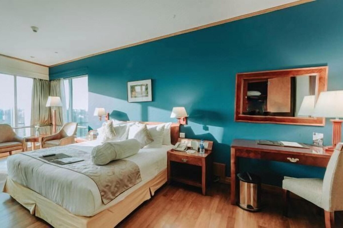 Egyptian cotton sheets, premium bedding, down comforters, minibar