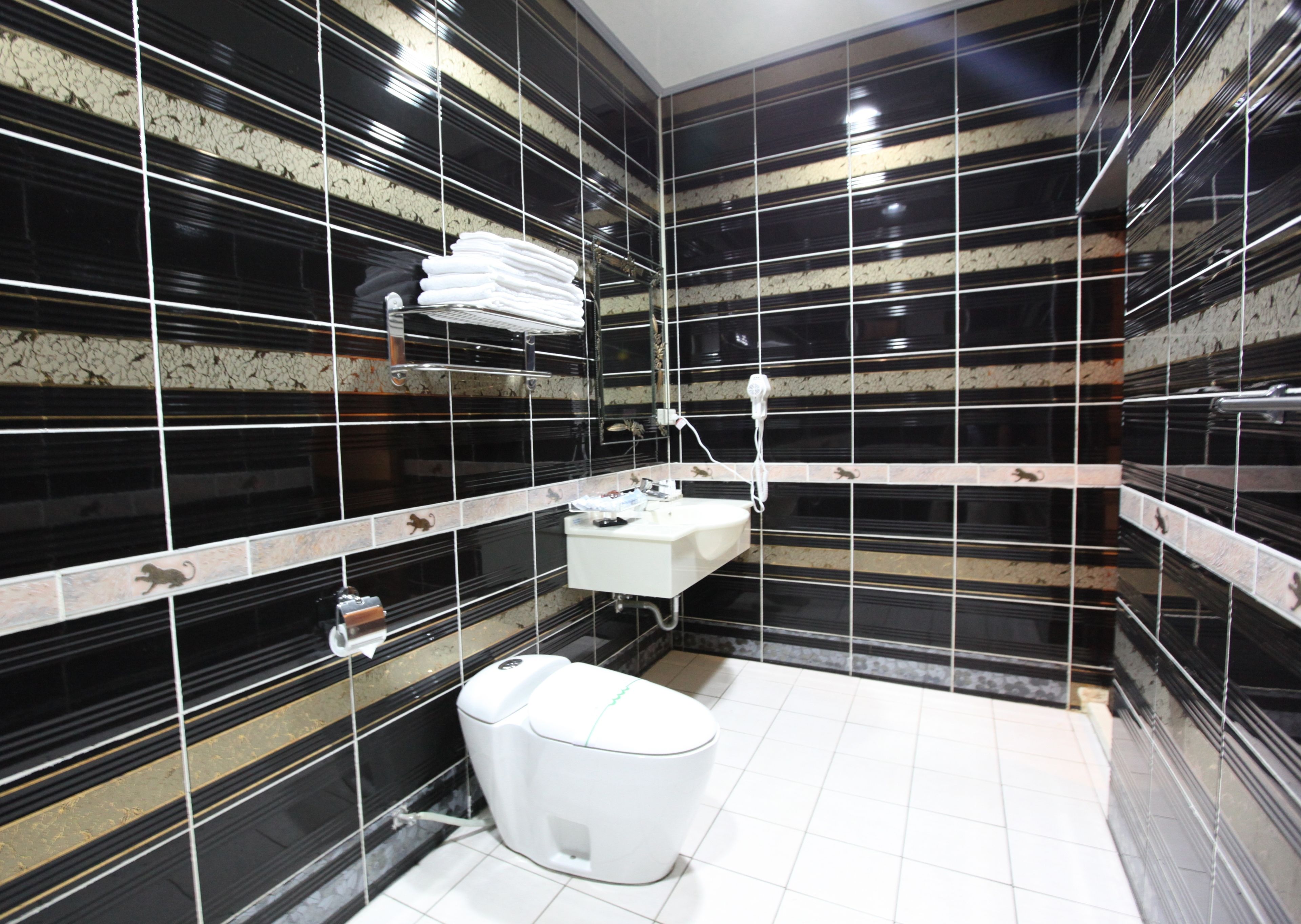 quadruple room | bathroom | shower, rainfall showerhead, free toiletries, hair dryer
