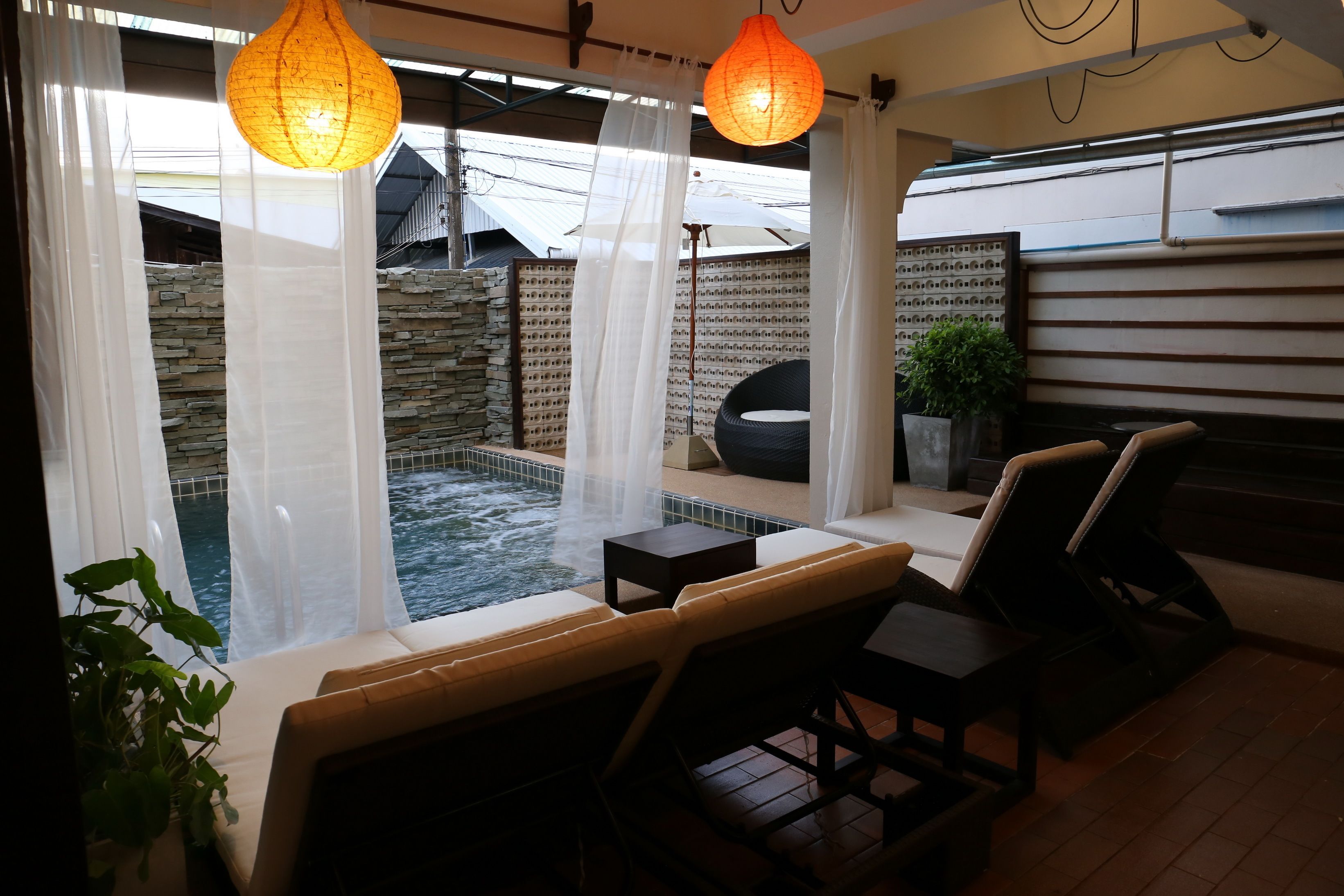 outdoor pool, pool umbrellas, pool loungers