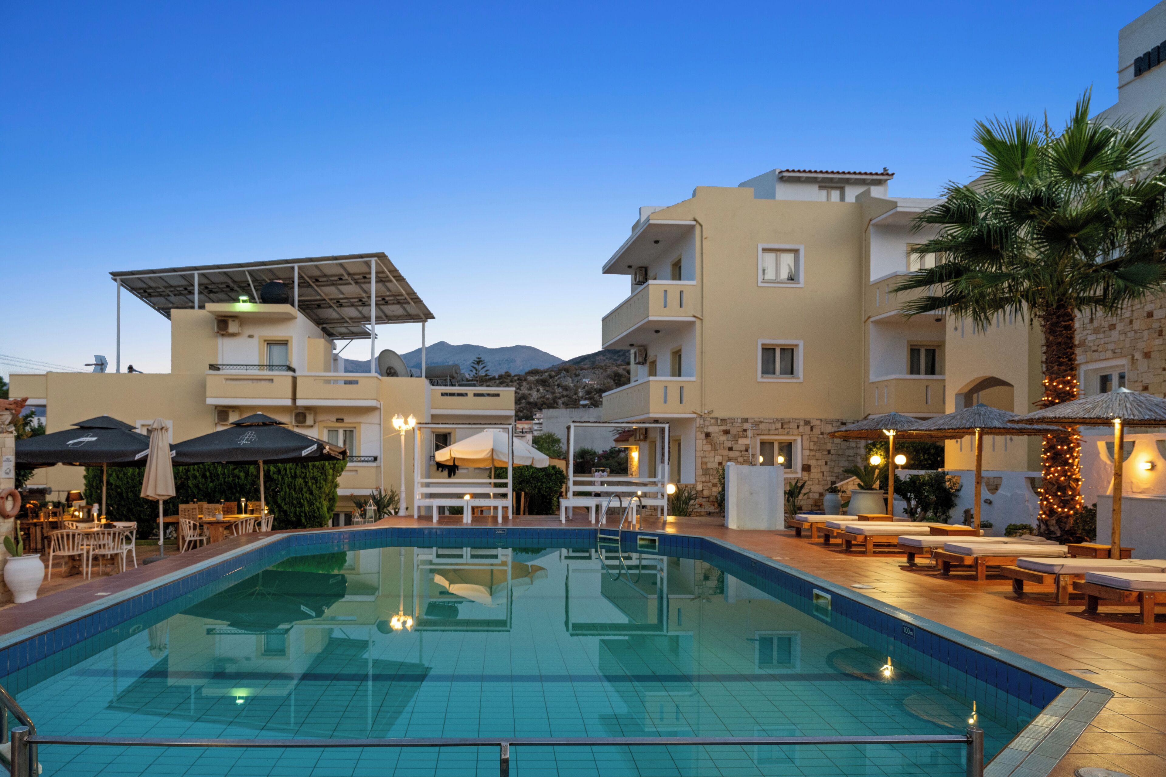 Seasonal outdoor pool, pool umbrellas, sun loungers