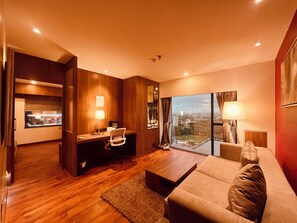 Premier Smart Suite | Living area | 42-inch LCD TV with digital channels, TV