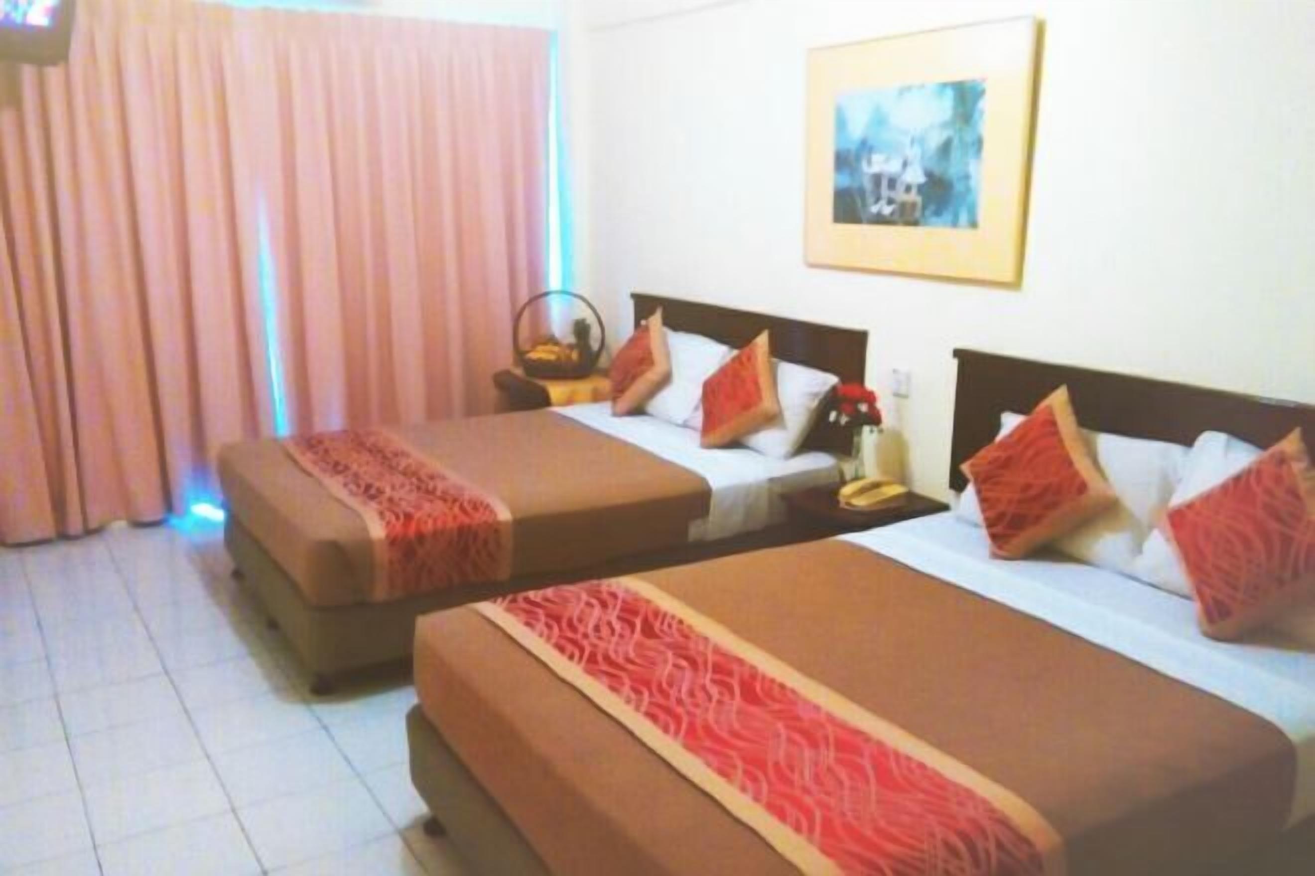 Desk, iron/ironing board, bed sheets