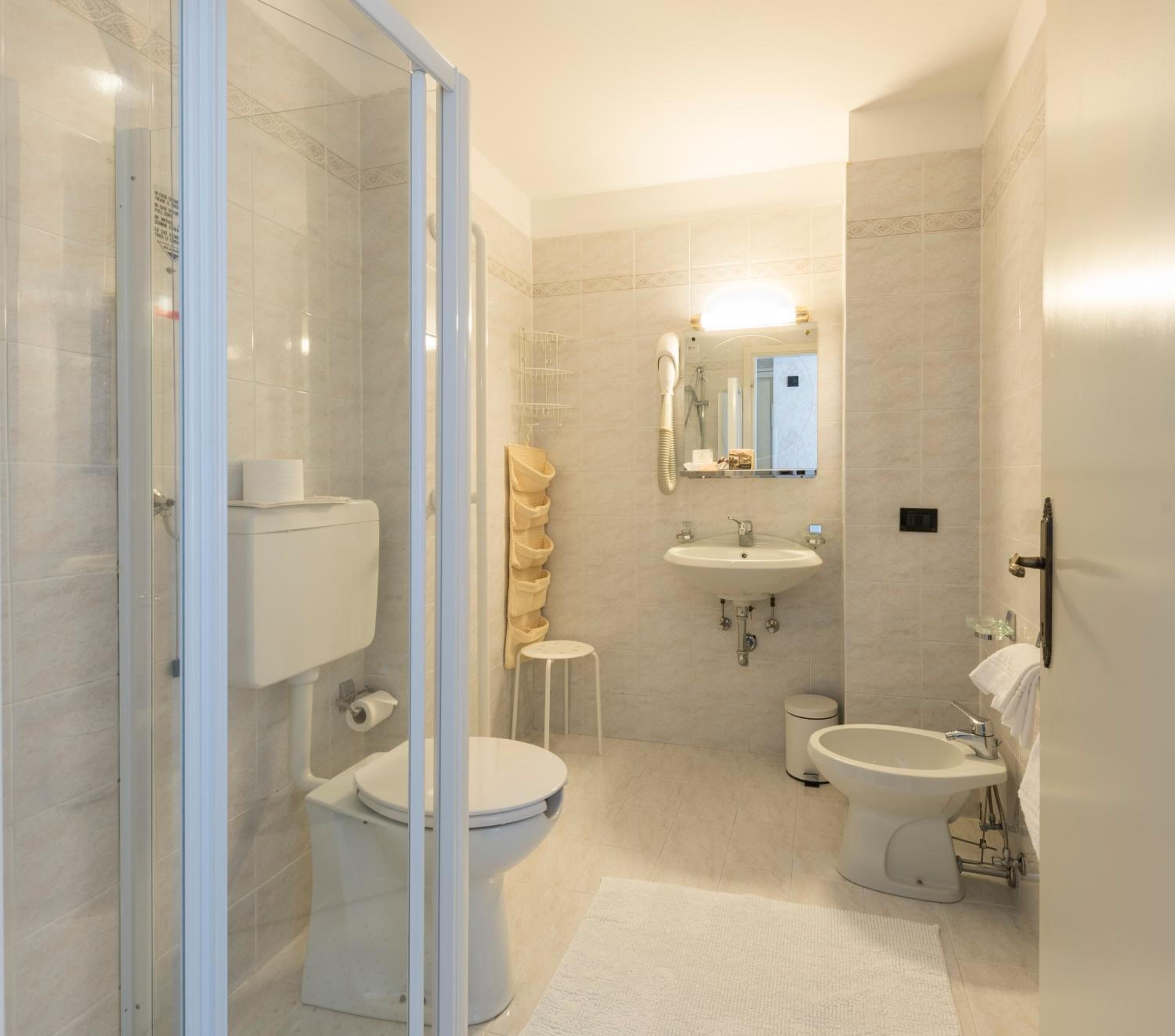 shower, designer toiletries, hair dryer, bathrobes