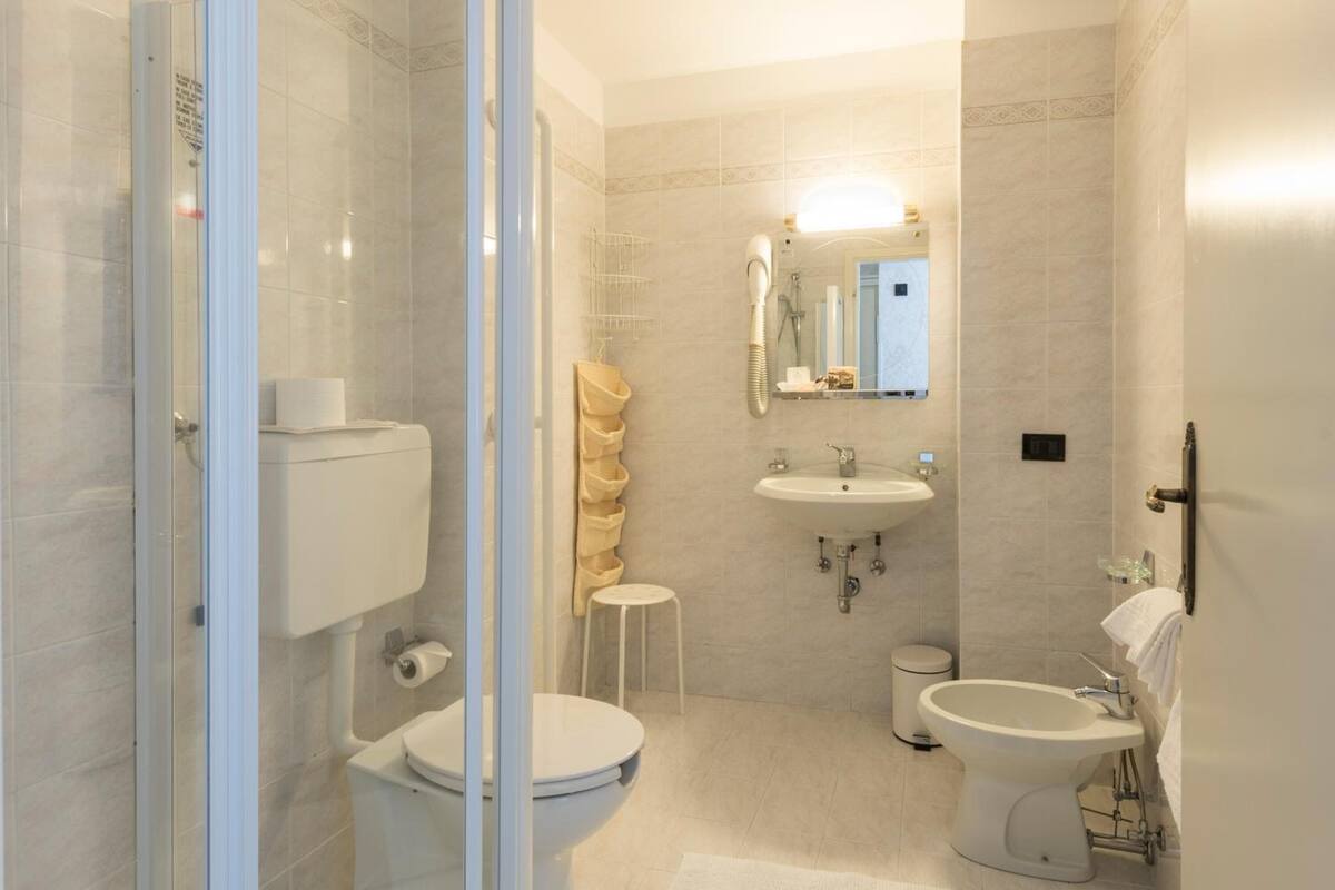 shower, designer toiletries, hair dryer, bathrobes