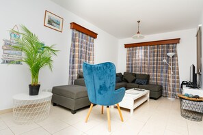 Villa, 4 Bedrooms, Partial Sea View | Living area | 43-inch flat-screen TV with satellite channels, TV - Kotsias Corallia Villas (Pegeia)