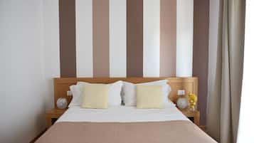 Triple Room | 1 bedroom, minibar, in-room safe, desk