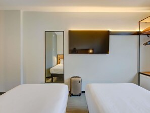 Standard Twin Room, 2 Single Beds | Minibar, desk, laptop workspace, soundproofing - ibis Rio de Janeiro Barra da Tijuca (Rio de Janeiro)
