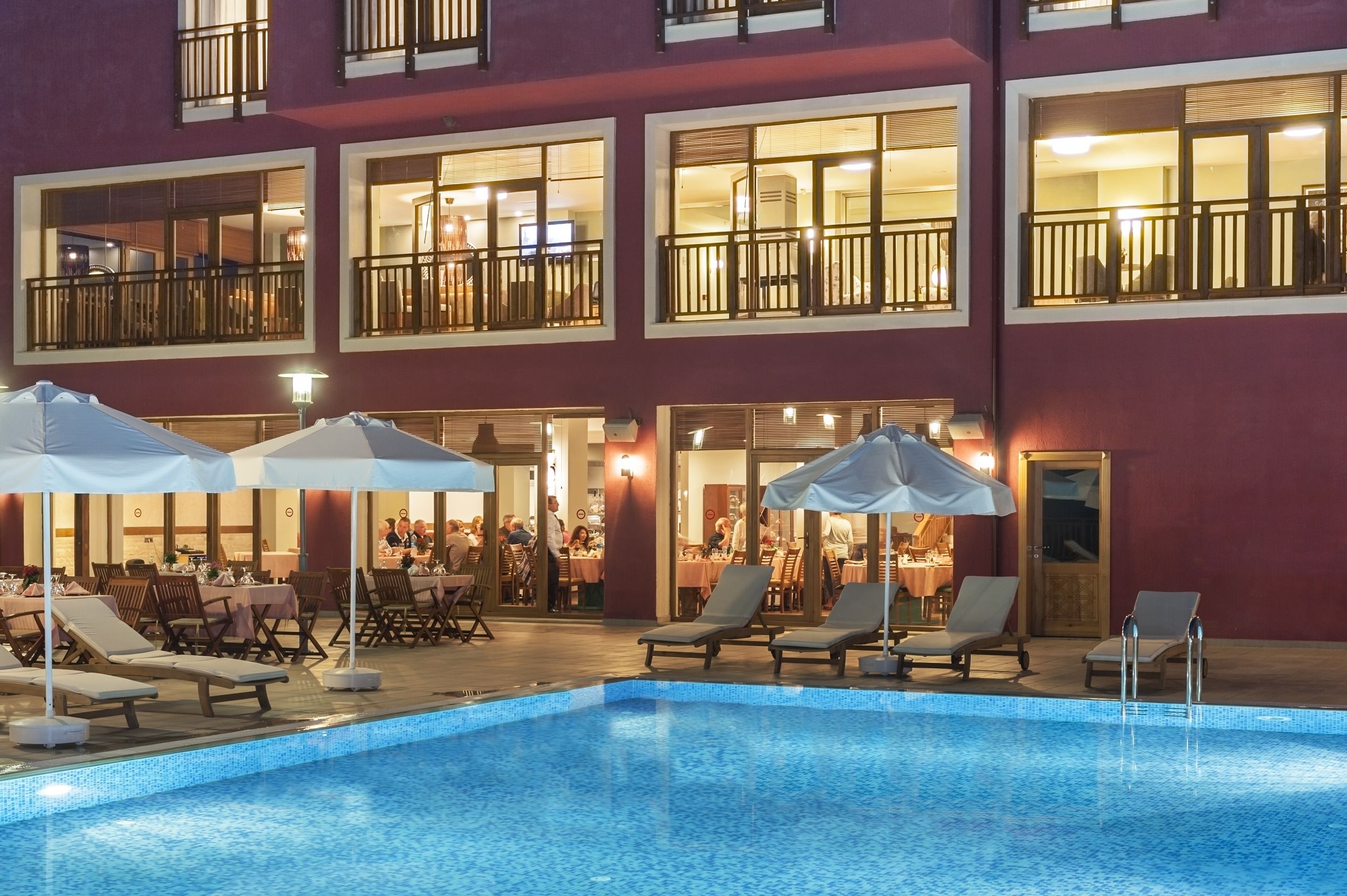 indoor pool, outdoor pool, pool umbrellas, pool loungers