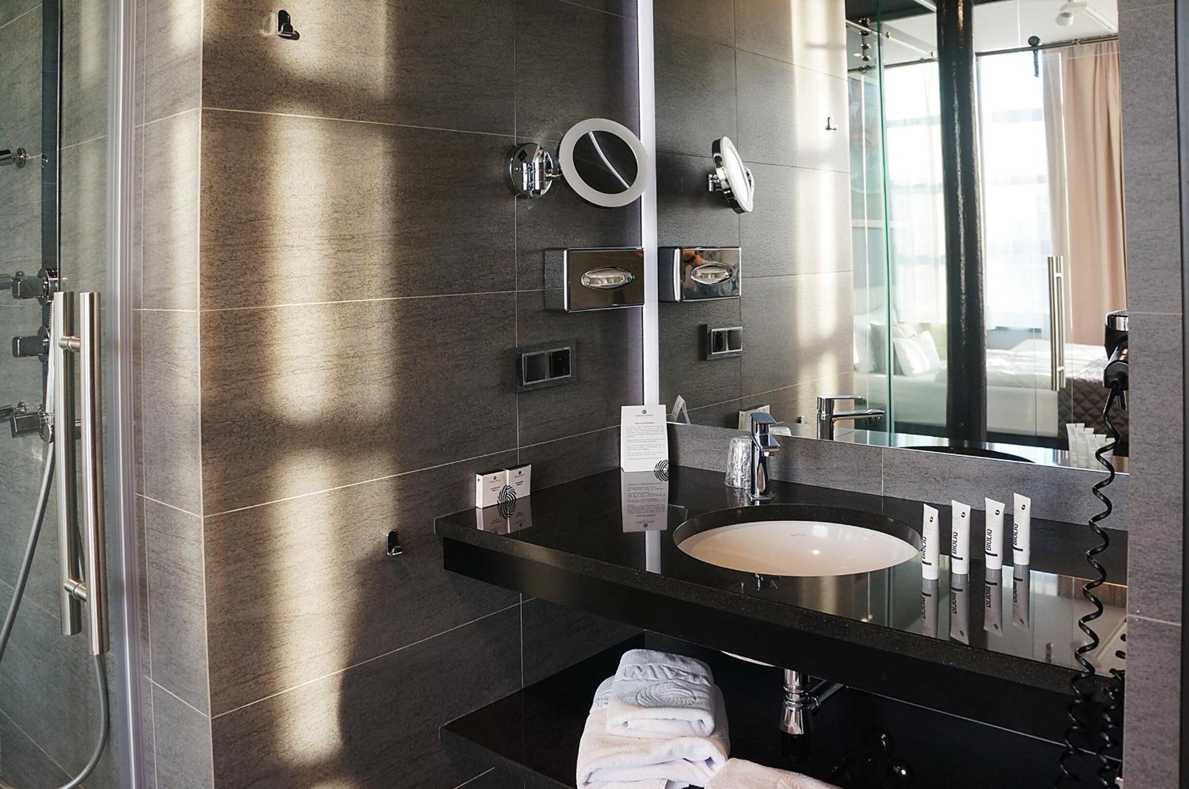 shower, free toiletries, hair dryer, slippers