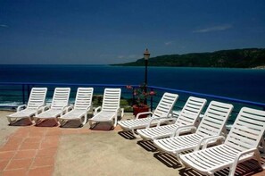 Outdoor pool, a waterfall pool, free cabanas, pool umbrellas