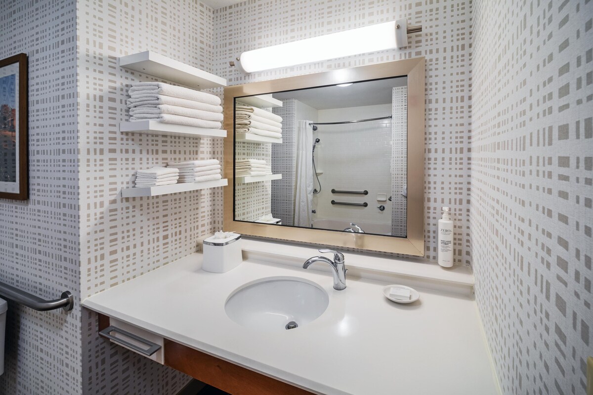 Bathtub, bathrobes, towels