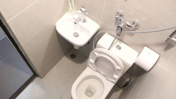 Shower, free toiletries, hair dryer, slippers