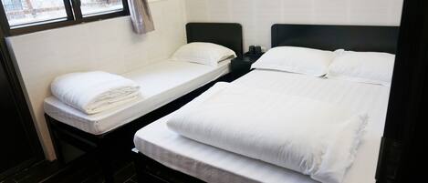 Cortinas blackout, wifi gratis y ropa de cama