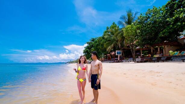 A beach with clear skies and calm waters. - Kim Hoa Resort (Phu Quoc)