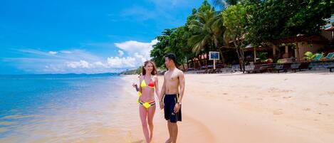 Private beach, white sand, sun-loungers, beach umbrellas