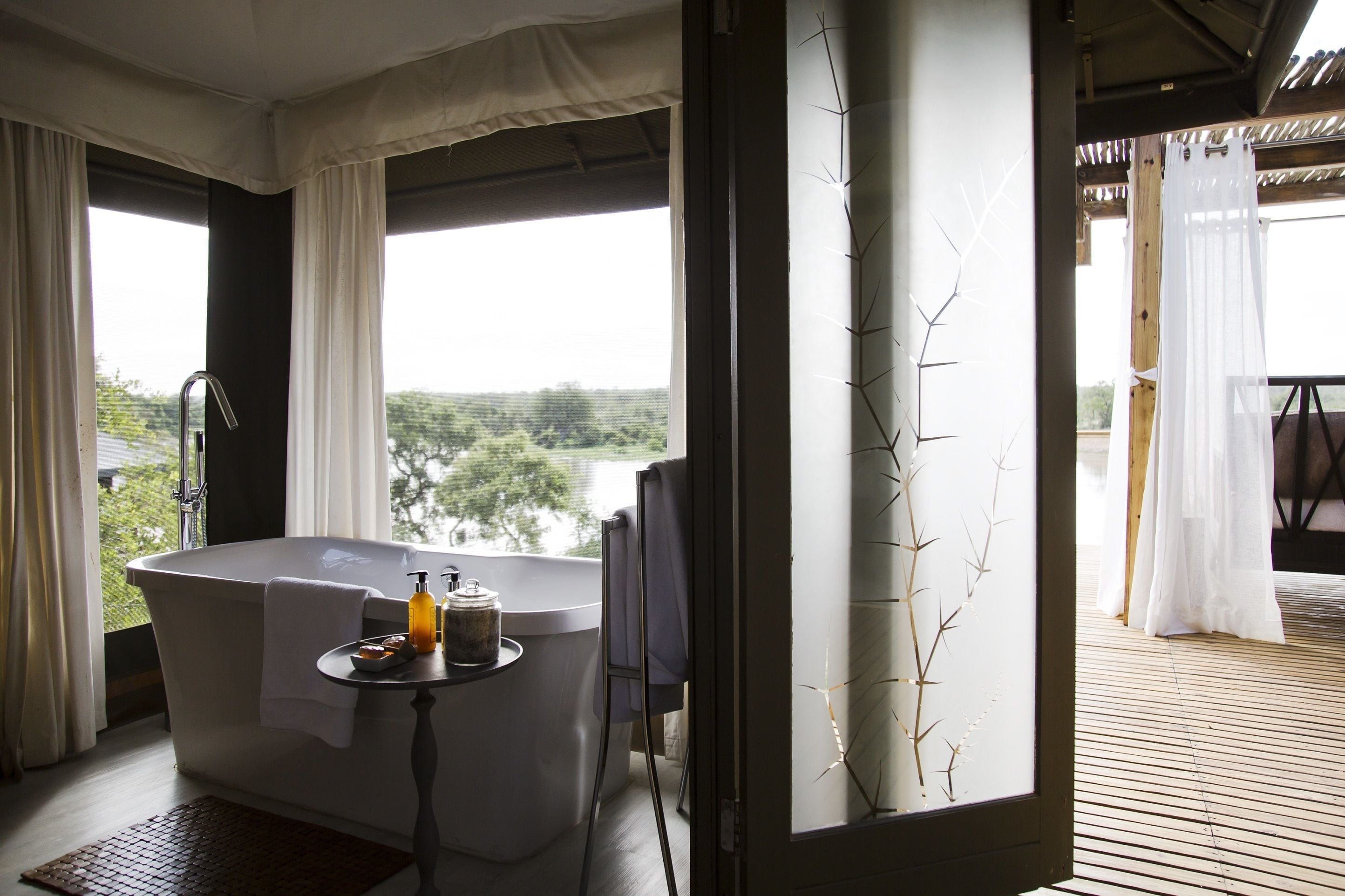 Luxury Tent | Bathroom amenities | Separate tub and shower, eco-friendly toiletries, hair dryer, bathrobes