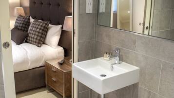 Shower, free toiletries, hair dryer, towels