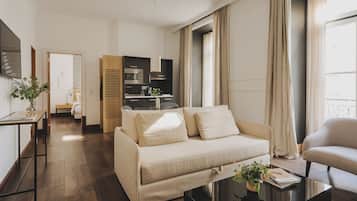 Apartment, 1 Bedroom | Living area | 43-inch flat-screen TV with cable channels, TV