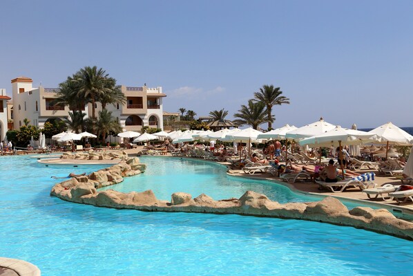 11 outdoor pools, pool umbrellas, sun loungers